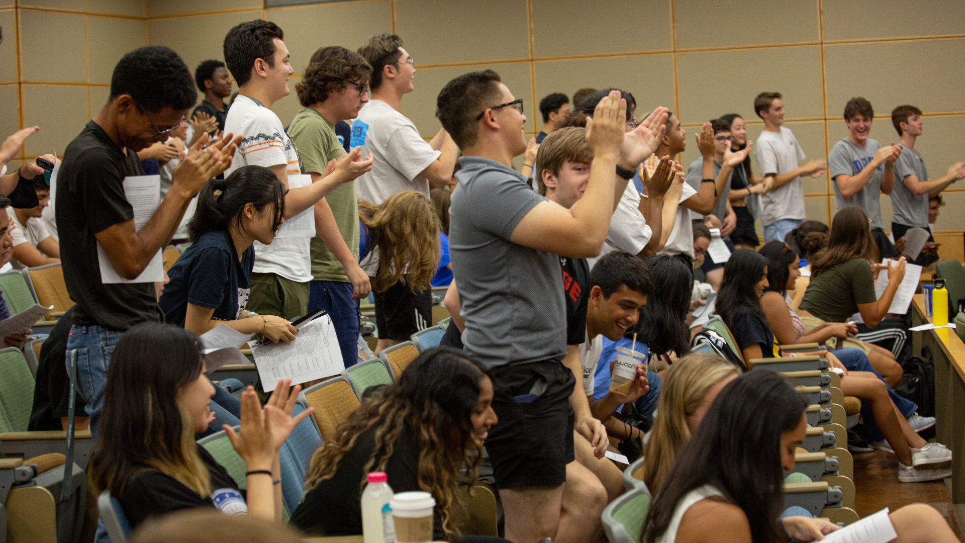 students applauding