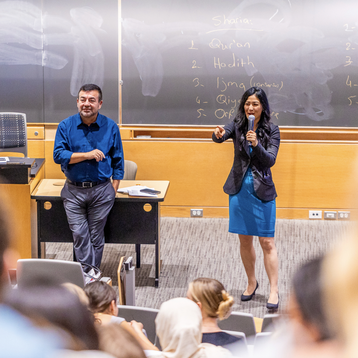 Duke professors Abdullah Antepli, left, and Polly Ha co-teach a class called "The Good Life." Photo by Jacob Whatley, Duke Photography