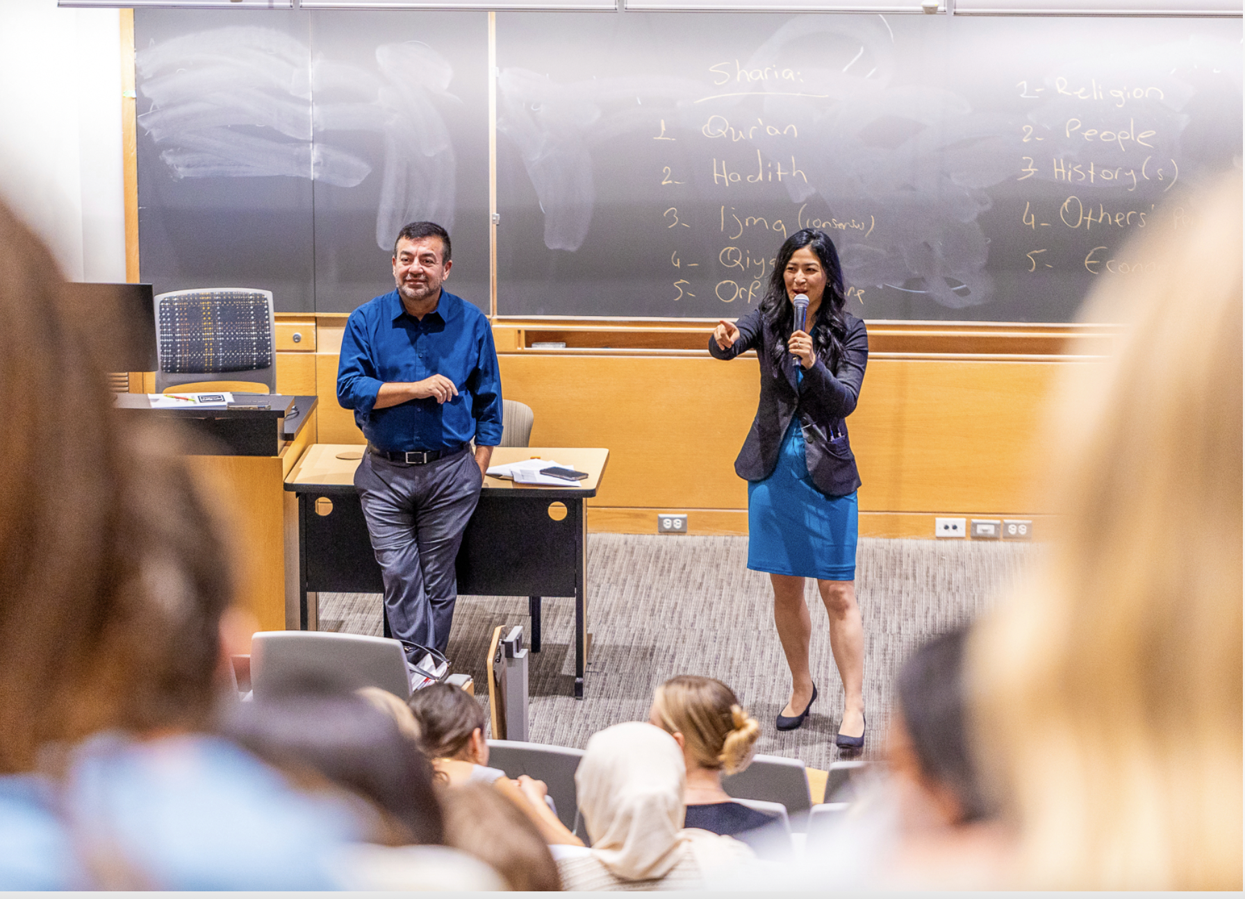 Duke professors Abdullah Antepli, left, and Polly Ha co-teach a class called "The Good Life." Photo by Jacob Whatley, Duke Photography